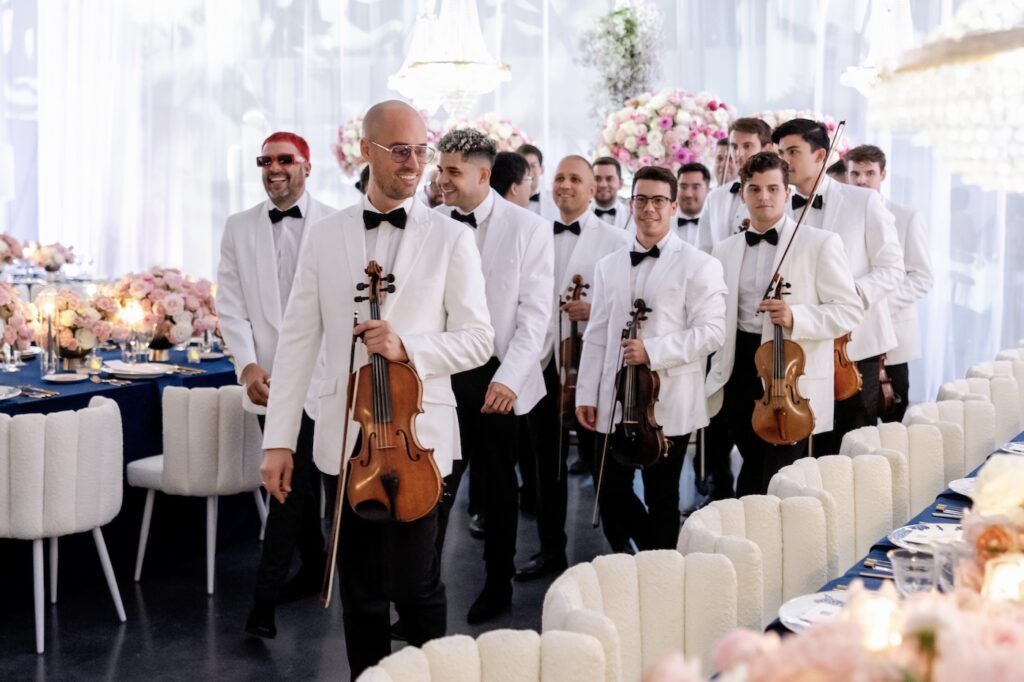 Male Pop String Orchestra at cosmetic brand launch event at the temple house in Miami, FL